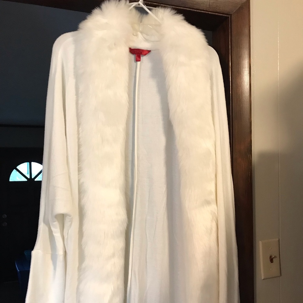 This is a JLo faux fur poncho